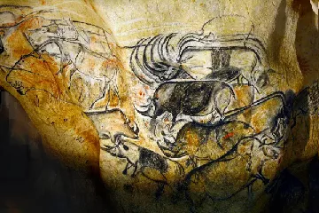 Peintures rupestres de la grotte Chauvet en Ardèche représentant des lions, rhinocéros et bisons, patrimoine mondial de l’UNESCO proche de nos chambres d’hôtes en Ardèche.